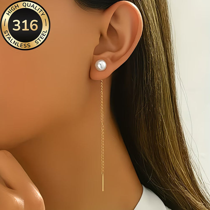 Close-up of women's elegant long tassel pearl earrings, showcasing the intricate drop and dangle design.
