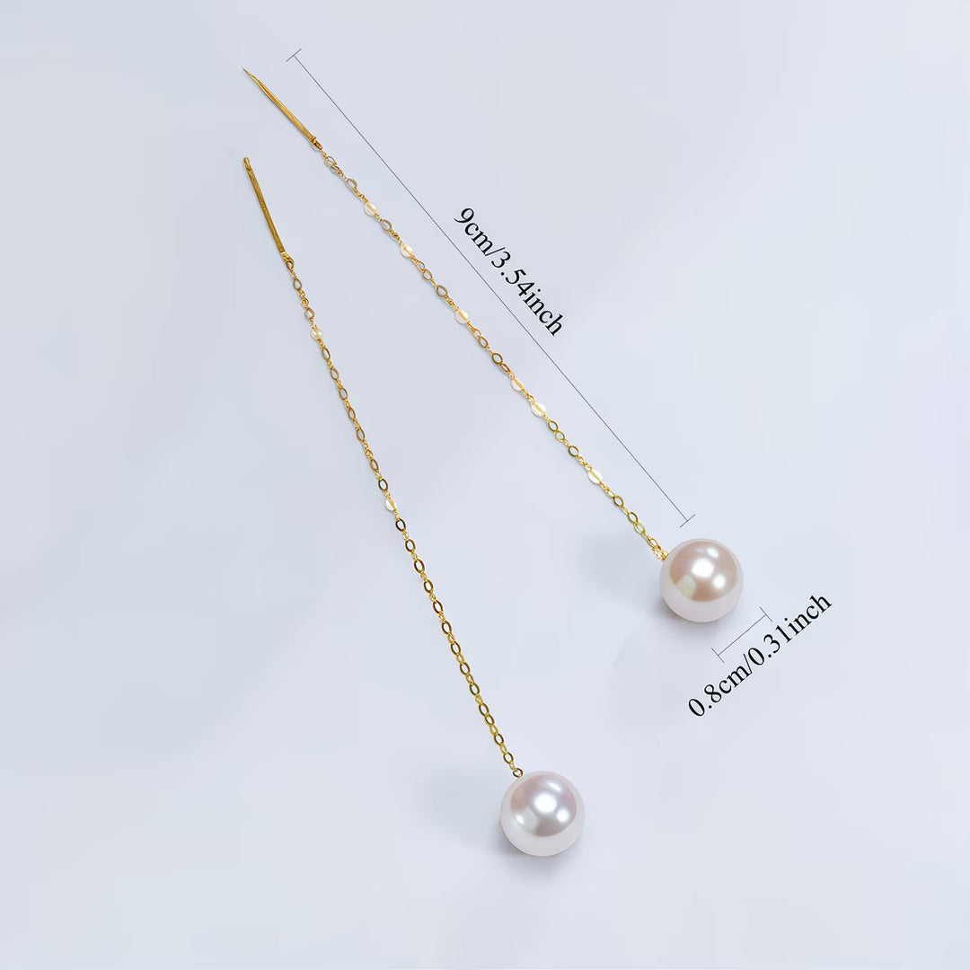 Beautiful women's long tassel pearl earrings. Elegant drop design, a timeless fashion jewelry piece.