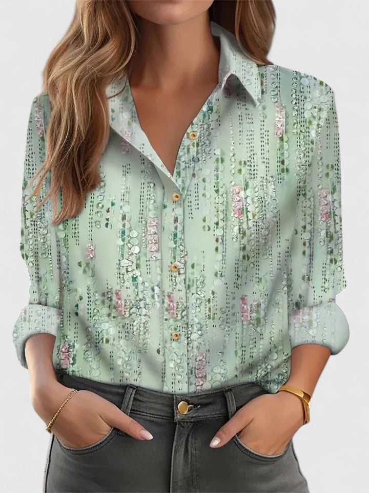 Elegant loose-fit women's blouse with long sleeves, perfect for versatile everyday or holiday style.