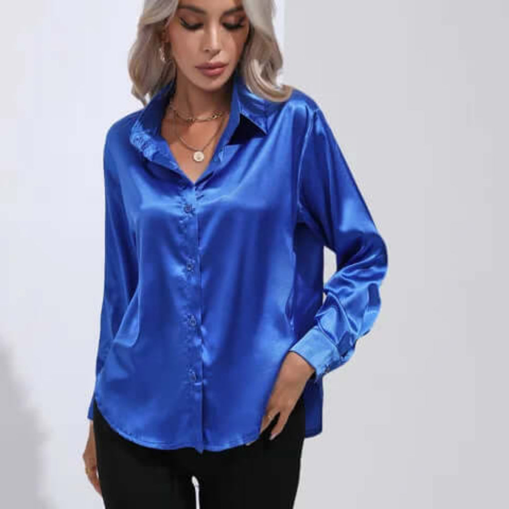 Elegant loose fit women's long sleeve blouse for versatile fashion. Chic casual or formal top.