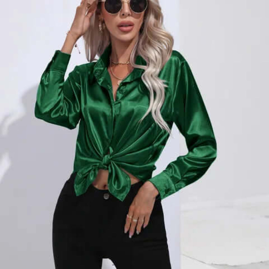 Graceful women's loose fit long sleeve blouse. Elegant top for work, casual, or formal occasions.