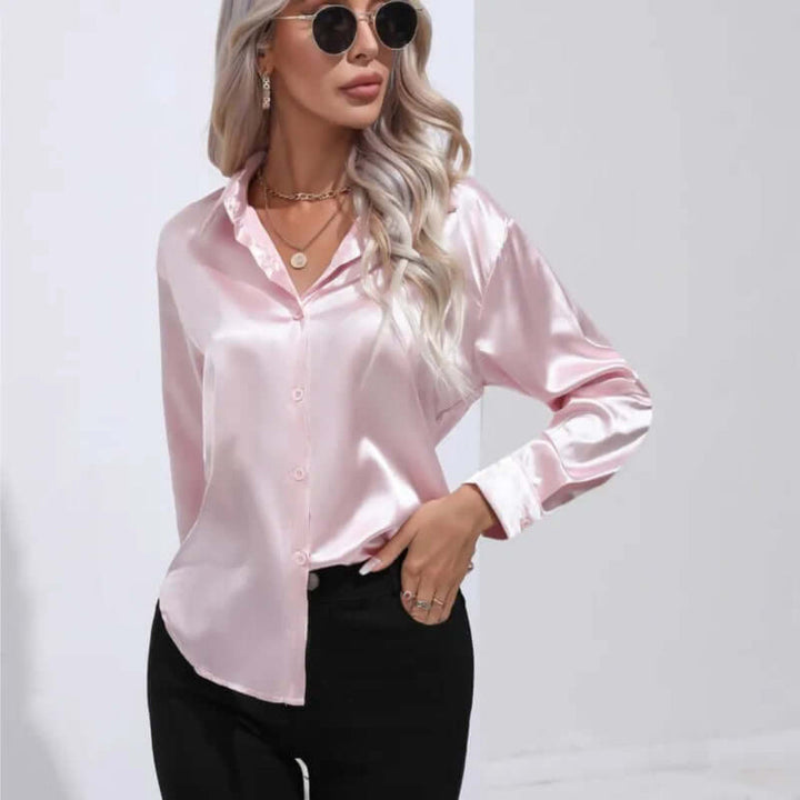 Flowy loose fit long sleeve women's blouse. Elegant and chic top, perfect for versatile fashion.