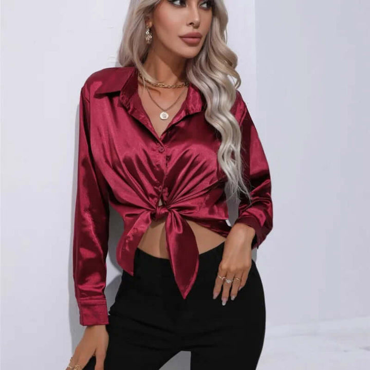 Chic women's elegant loose fit long sleeve blouse. Versatile top for casual, formal & workwear.