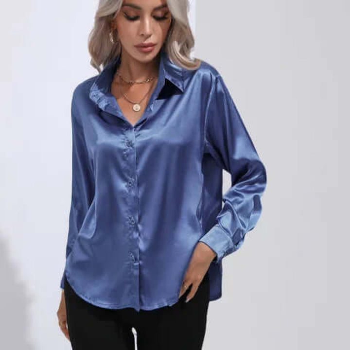Classic elegant women's loose fit long sleeve blouse. A versatile chic top for contemporary fashion.