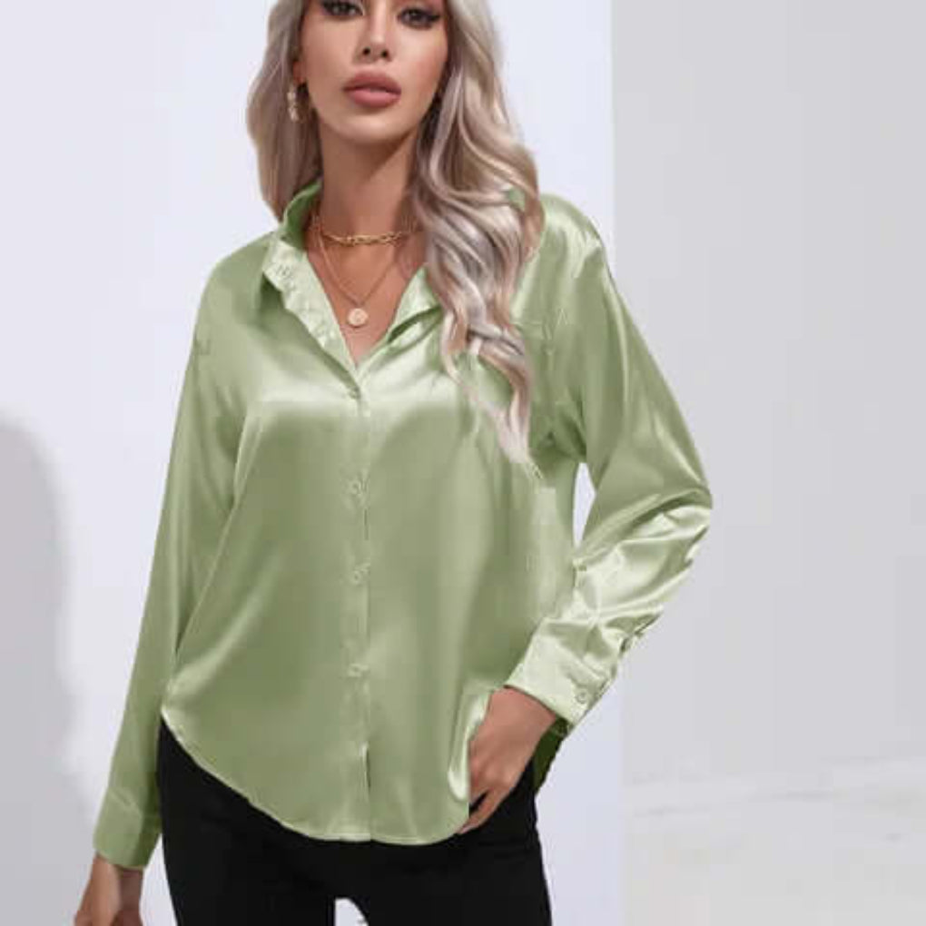 Chic women's loose fit long sleeve blouse. An elegant and comfortable top for modern fashion.