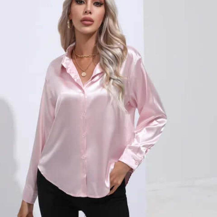 Comfortable & chic women's loose fit long sleeve blouse. Elegant top for casual or formal wear.