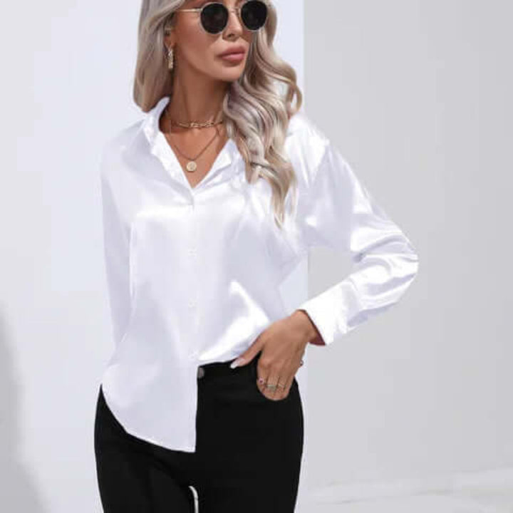 Women's elegant long sleeve loose fit blouse. Versatile chic top for casual, formal, or work.