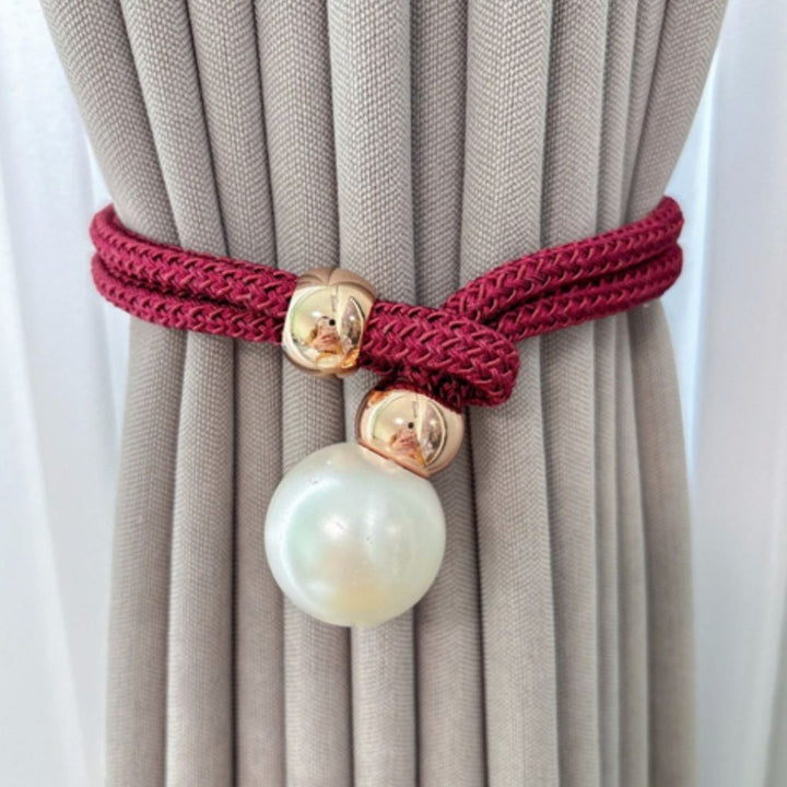 Set of 2 elegant pearl curtain tie backs with strong magnetic closure for easy window styling.
