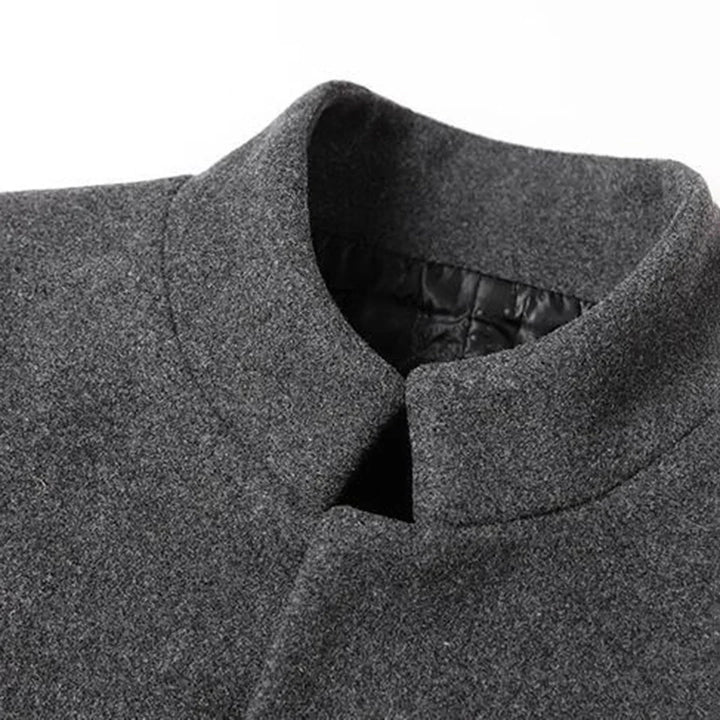 Men's formal long winter coat. Elegant and classic outerwear, ideal for sophisticated business or special occasions.