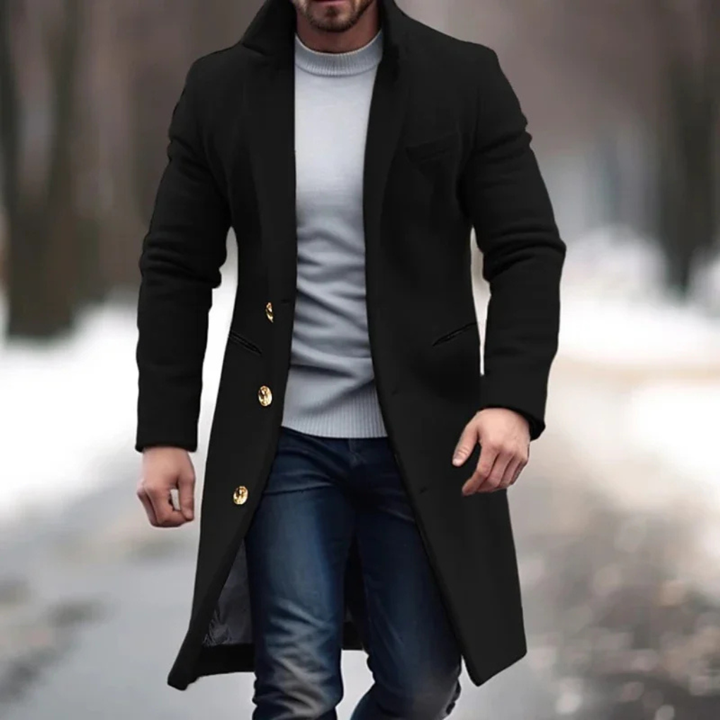 Elegant men's longline overcoat in black, perfect for formal or smart casual wear in cooler weather. Classic tailored style.