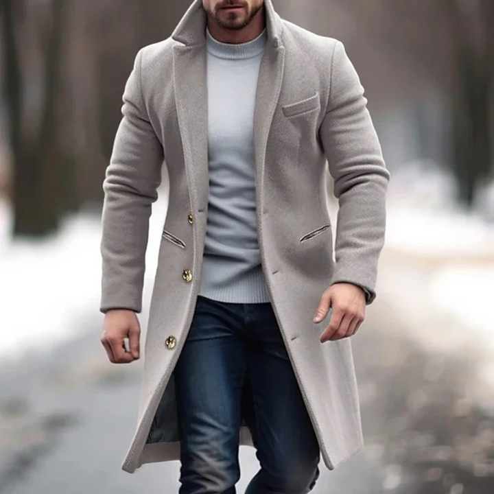 Versatile men's long coat in khaki, ideal for smart casual or formal occasions. Timeless tailored overcoat for cool weather.
