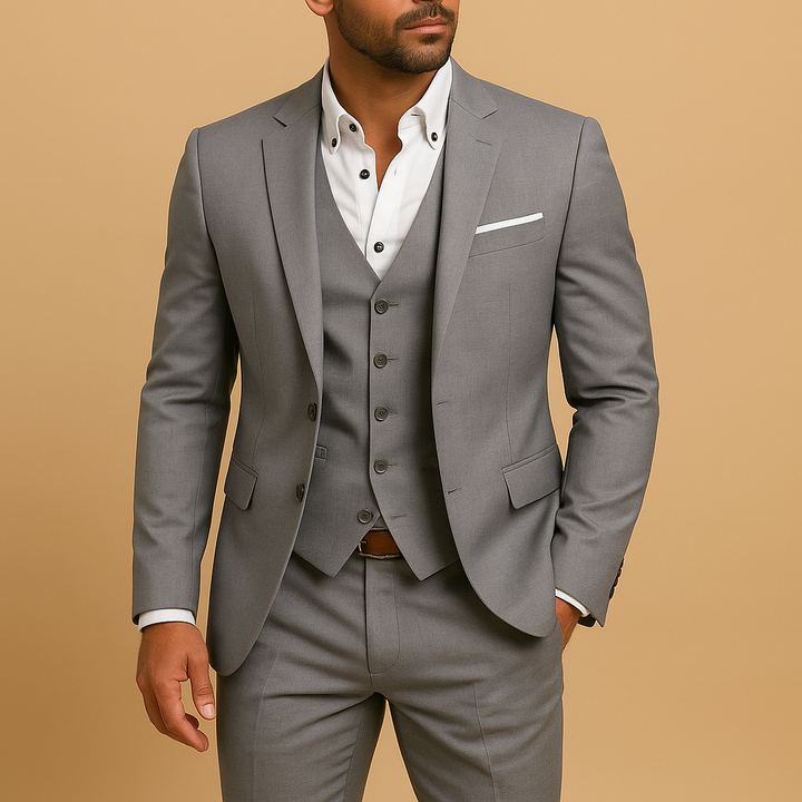 Sophisticated men's three-piece suit with waistcoat, ideal for special occasions, weddings & formal business.
