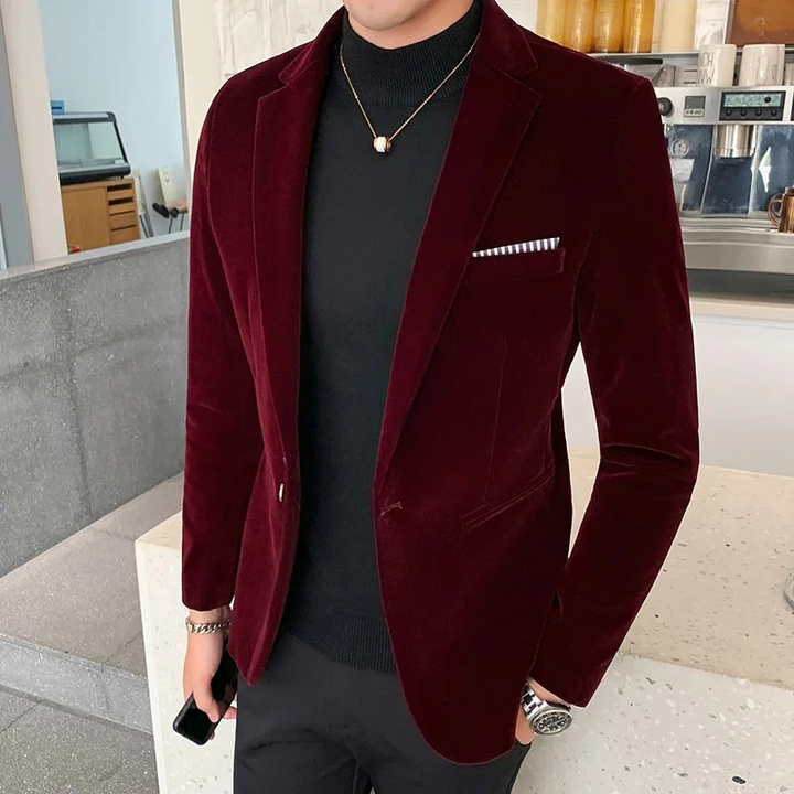 Trendy men's slim fit velvet blazer, a sleek one-button suit jacket. Ideal for modern formal fashion & parties.