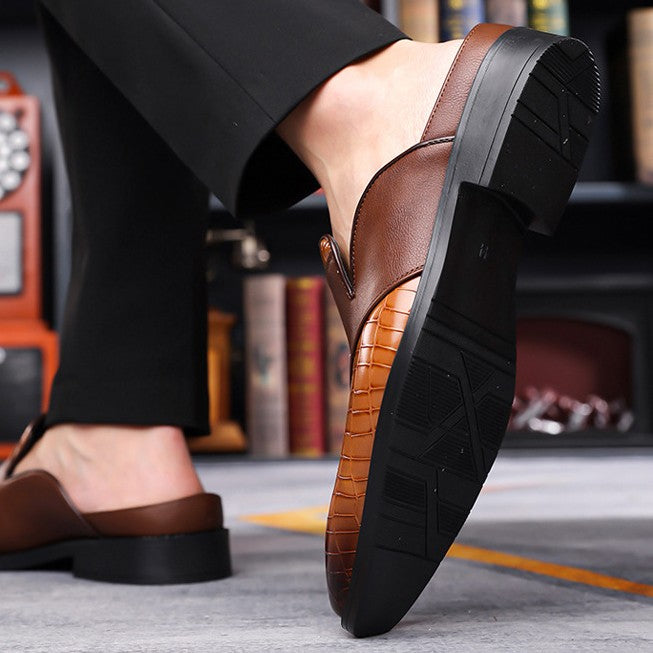 Formal men's dress loafers with cushioned insole. Elegant slip-on shoes for sophisticated men's fashion.