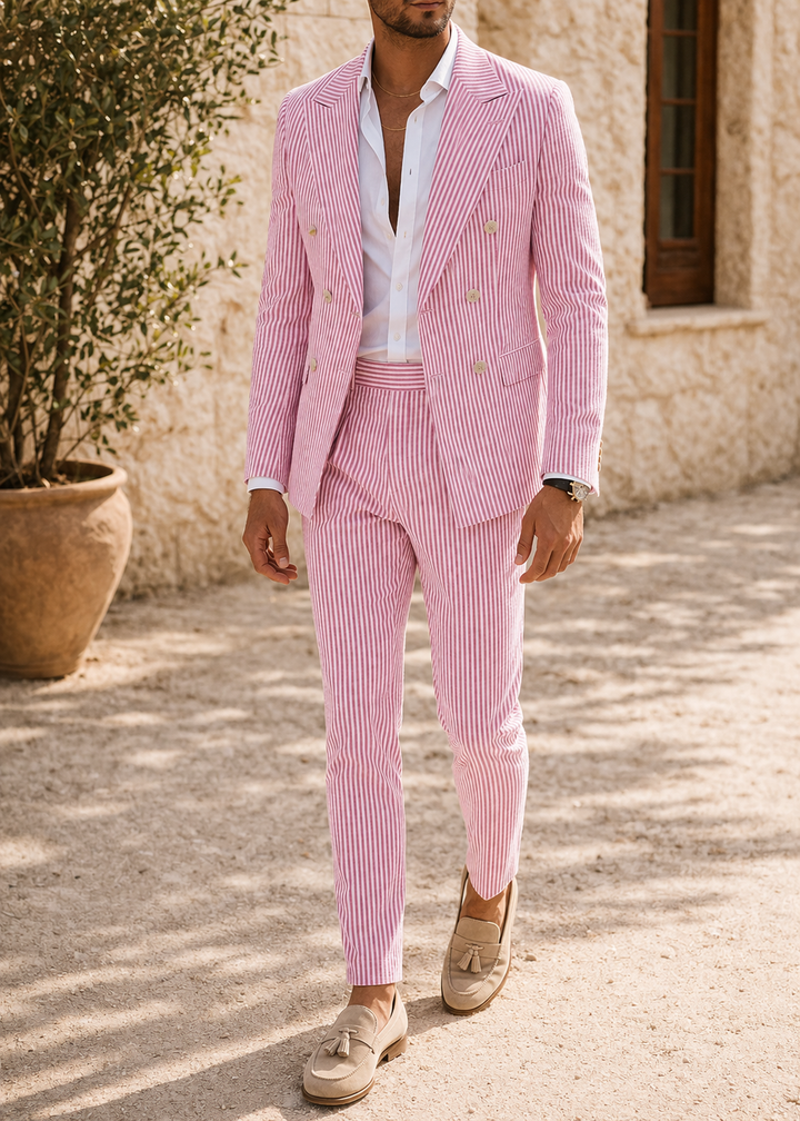 Tailored men's fashion: a sophisticated double-breasted striped suit, ideal formal wear for weddings.