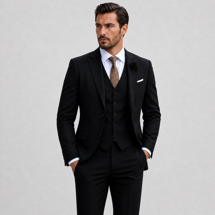 Tailored men's three-piece suit with sleek blazer, elegant waistcoat, and well-fitted trousers, designed for formal events.
