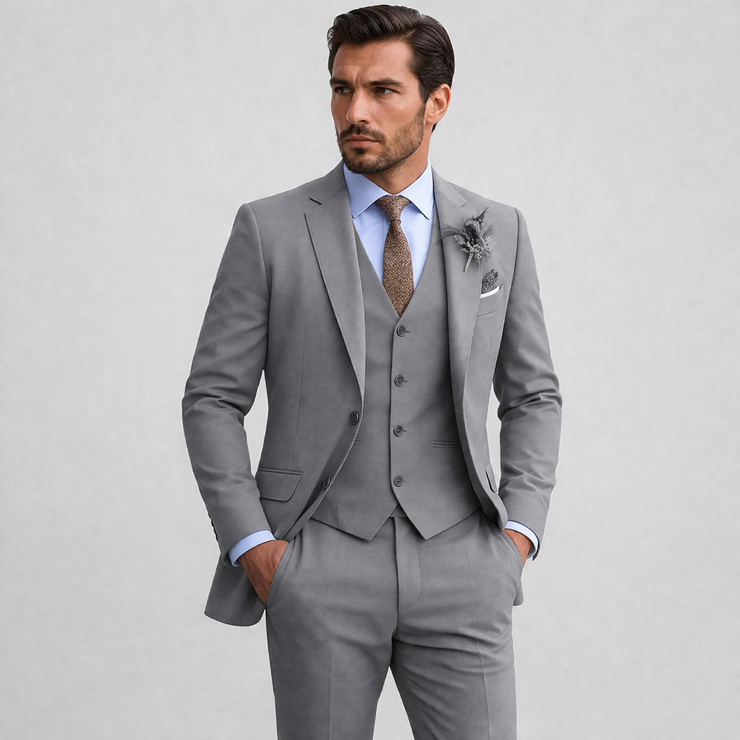 Classic men's elegant three-piece formalwear suit, comprising a blazer, waistcoat, and trousers, suitable for weddings.