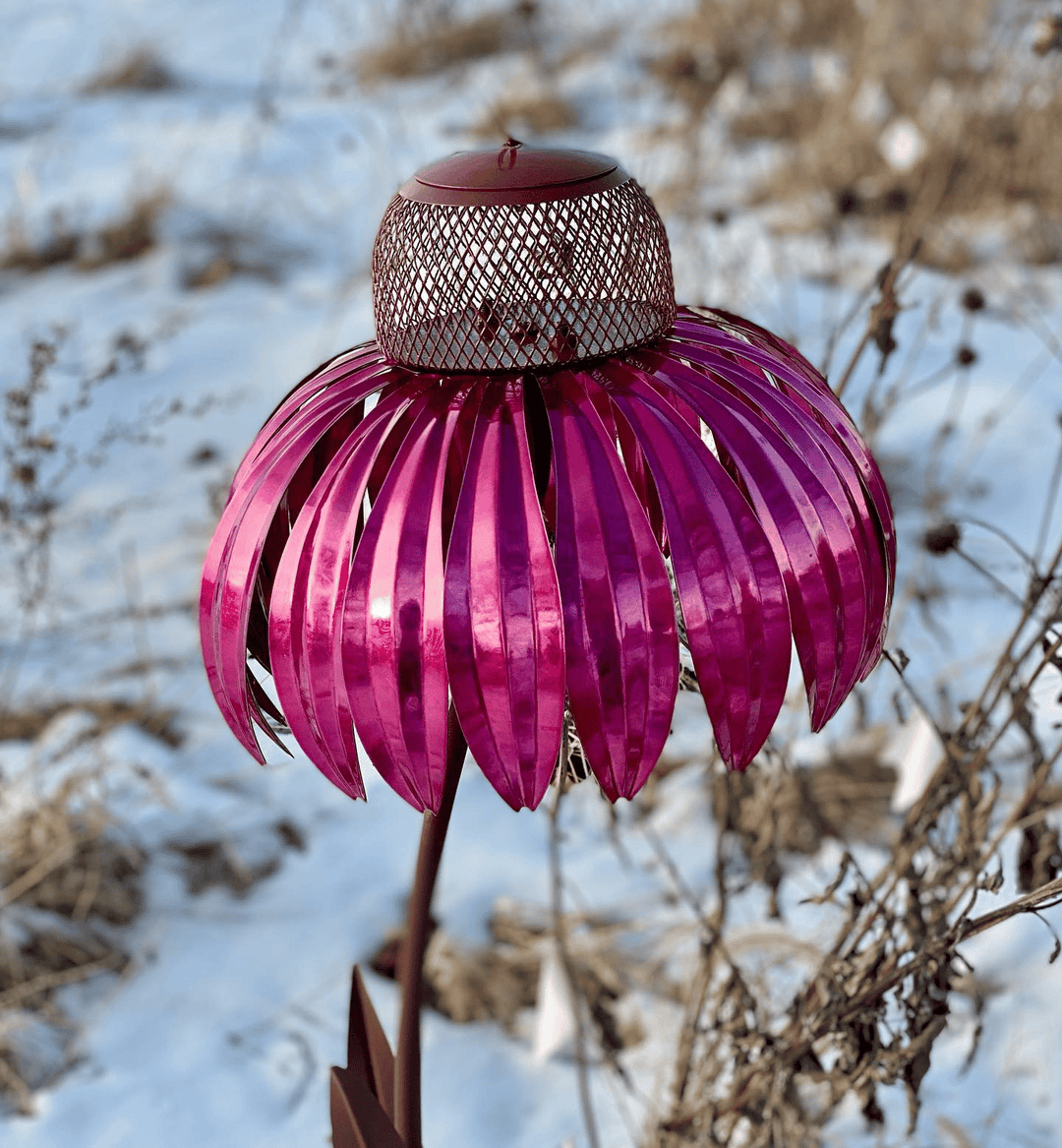 Handcrafted metal flower bird feeder house. Exquisite garden decor, inviting birds to your peaceful outdoor space.