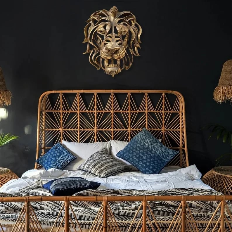 Versatile metal lion head wall accent, a powerful and elegant sculpture suitable for indoor or outdoor decor.