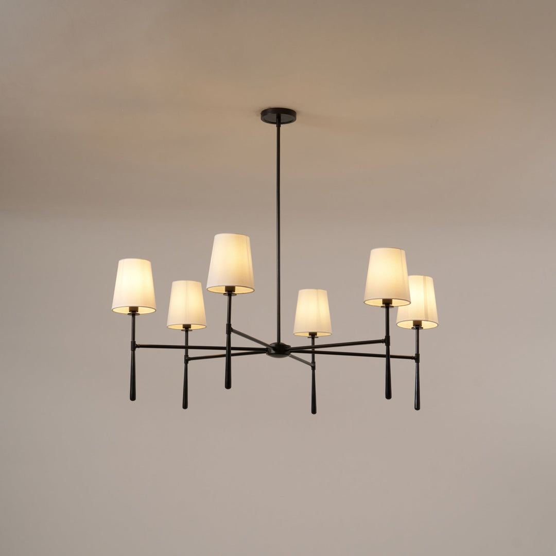 Black mid-century modern chandelier, statement piece for dining areas.