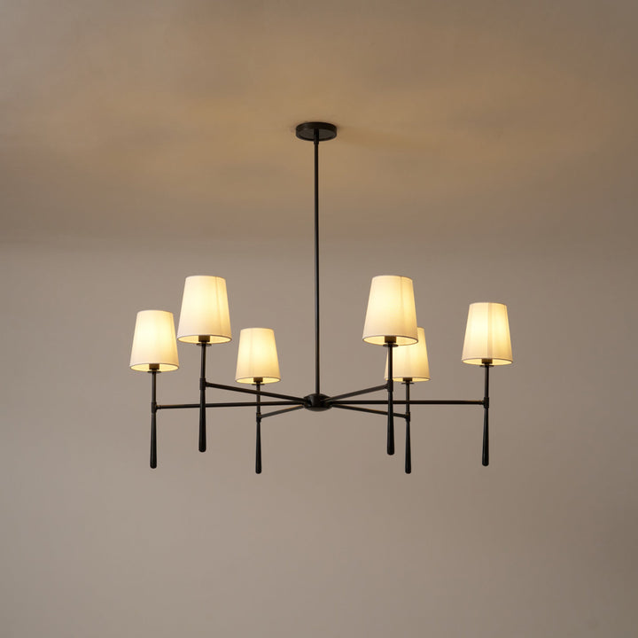 Hardwired mid-century chandelier, black finish, for living room decor.