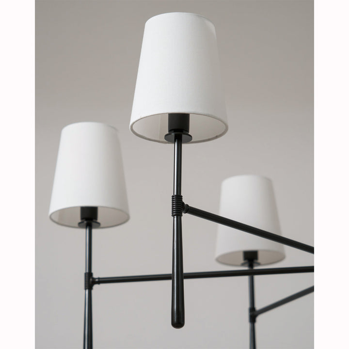 Elegant bedroom chandelier, mid-century modern, brass finish.