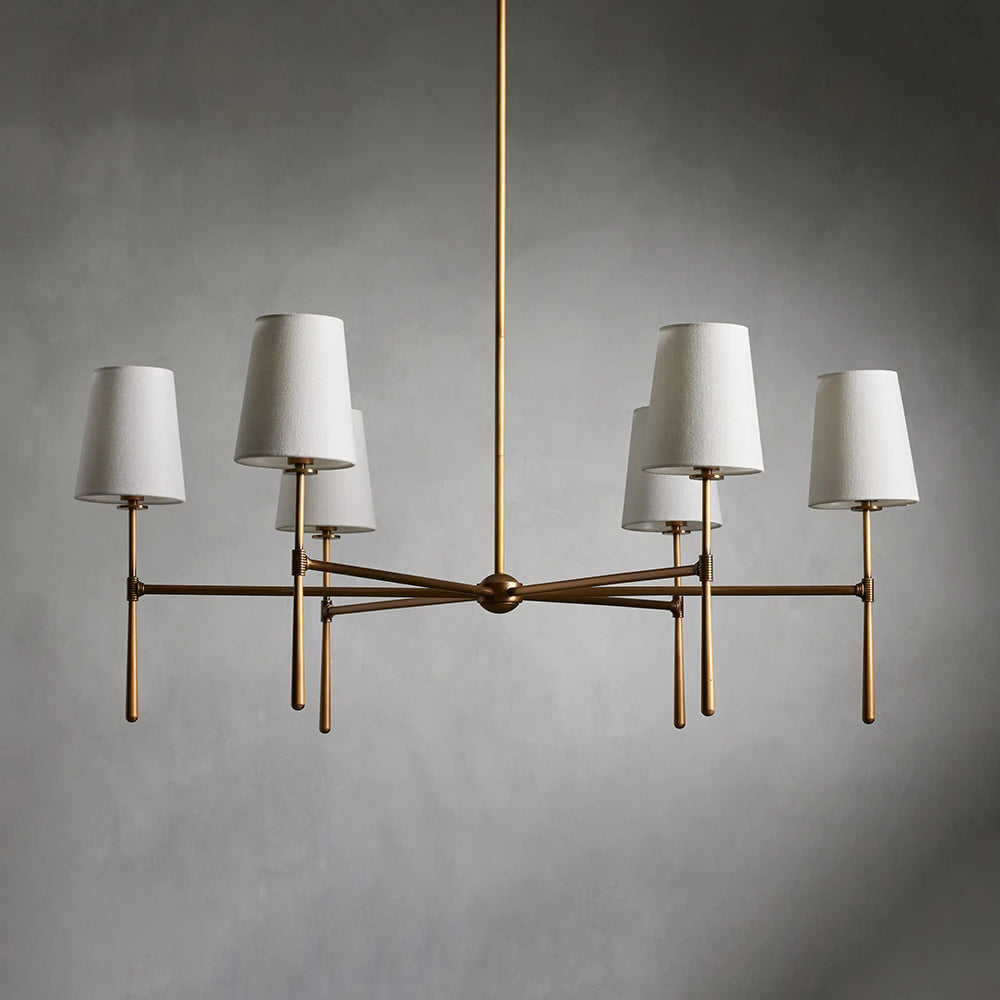 Elegant modern chandelier, brass finish, hardwired for dining room.