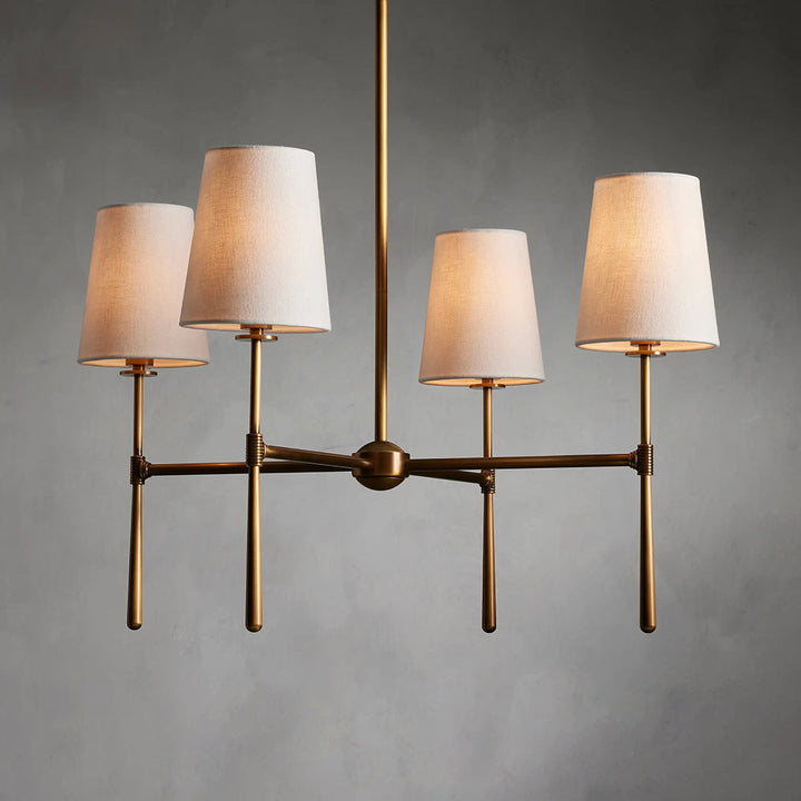 Brass finish mid-century chandelier, elegant modern lighting.