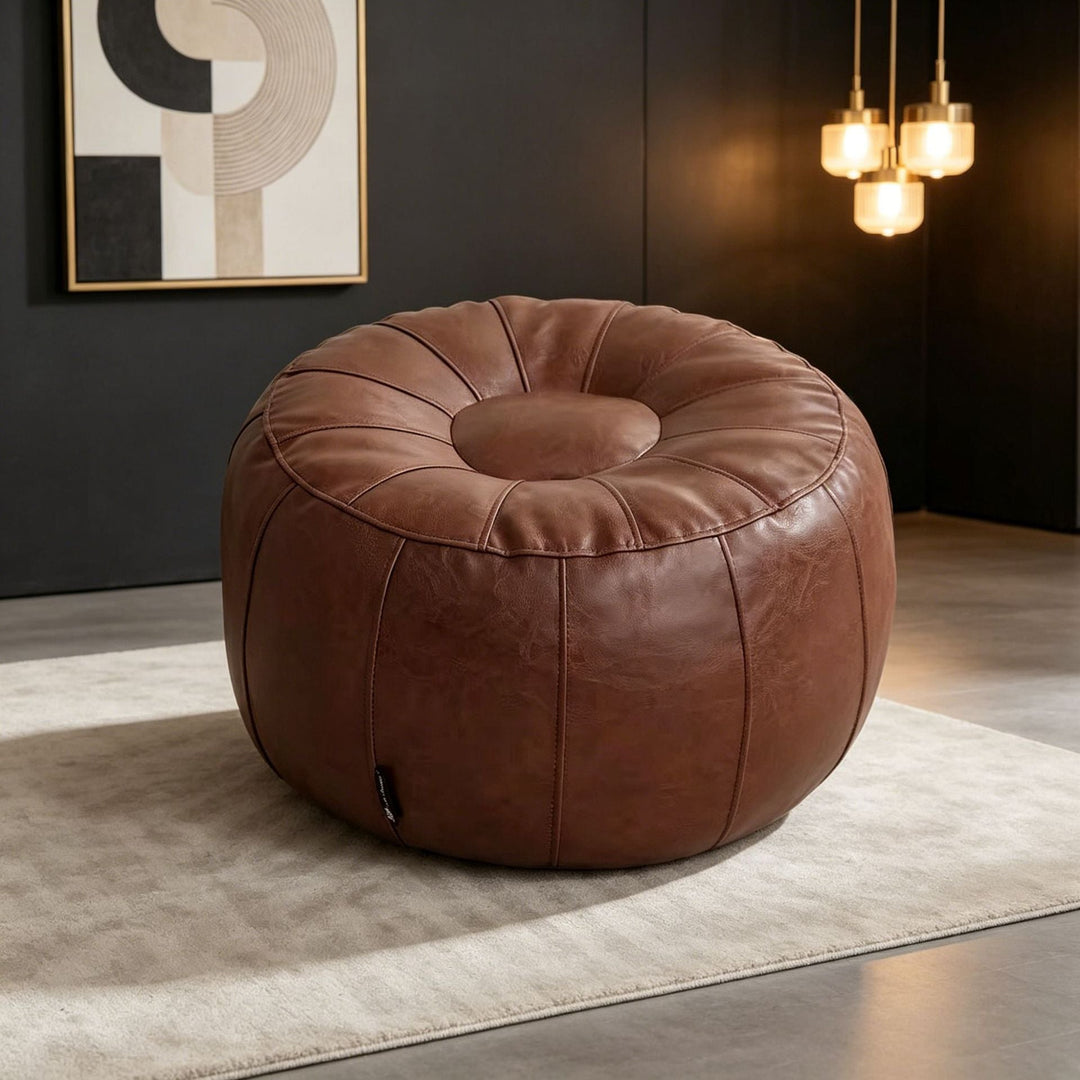 Luxurious round accent stool with modern design. Elegant contemporary furniture for stylish living room or bedroom decor.