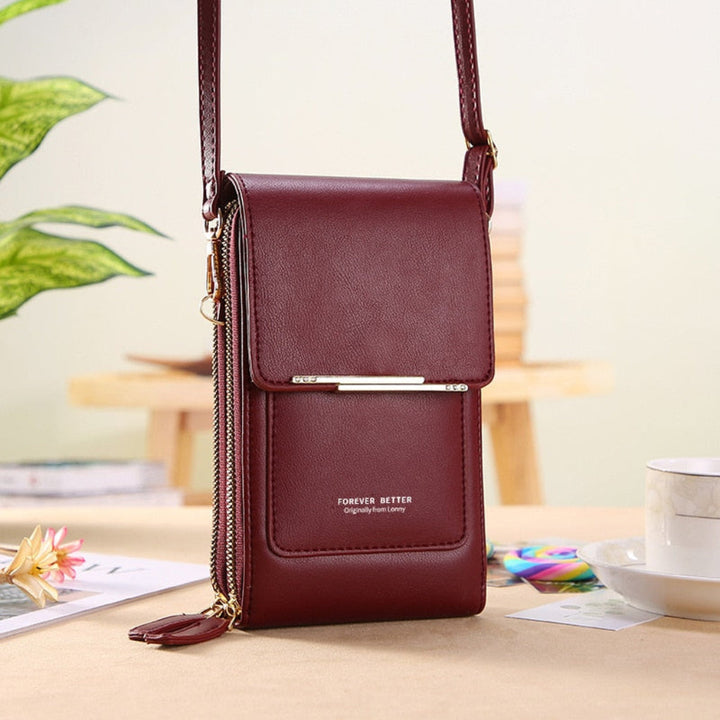 Fashionable multi-color women's smart touchscreen handbag, combining style with practical phone access.
