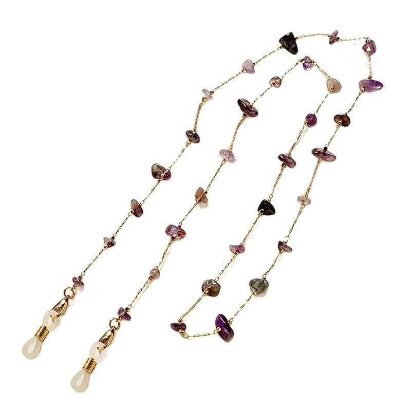 Layered gemstone necklace, a vibrant and elegant women's fashion piece.