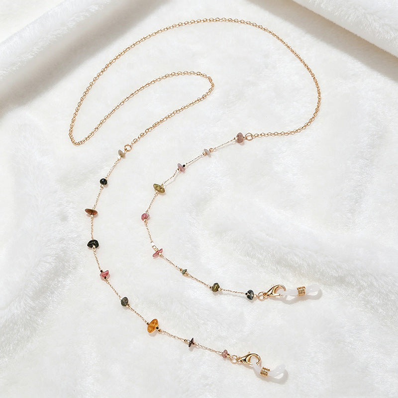 Women's colorful gemstone necklace, multi-strand elegant design.