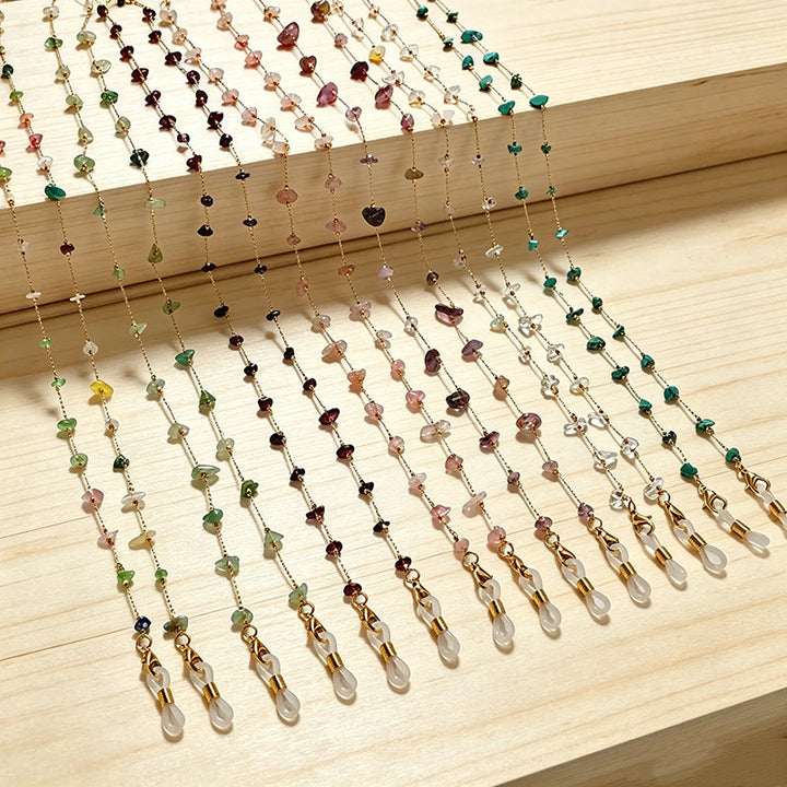 Beautiful women's elegant necklace with multiple gemstone strings.