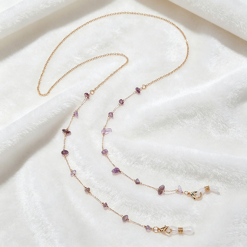 Gemstone multi-string necklace, an elegant accessory for women.