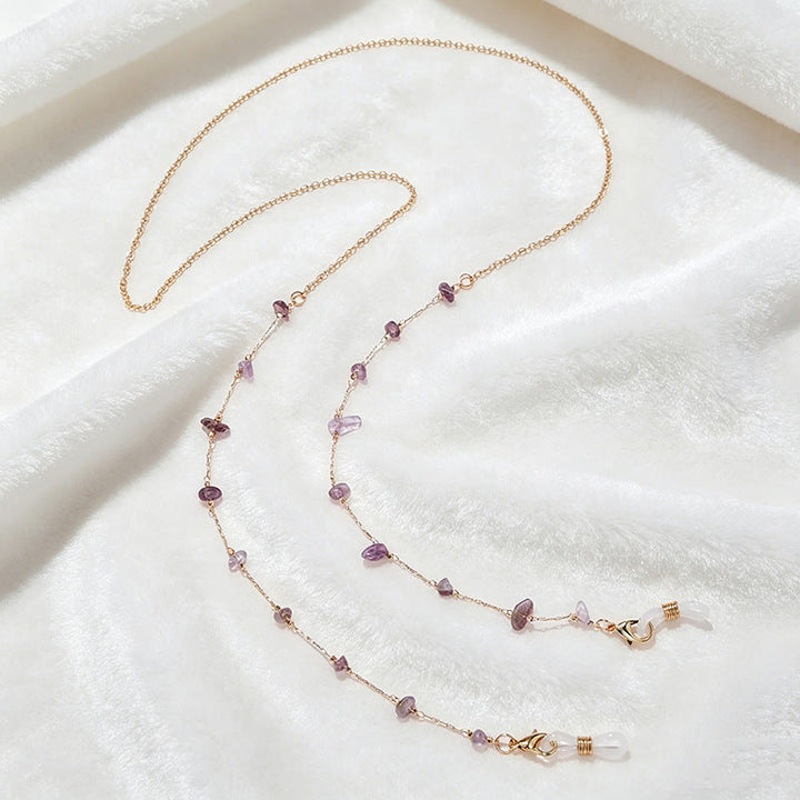 Gemstone multi-string necklace, an elegant accessory for women.