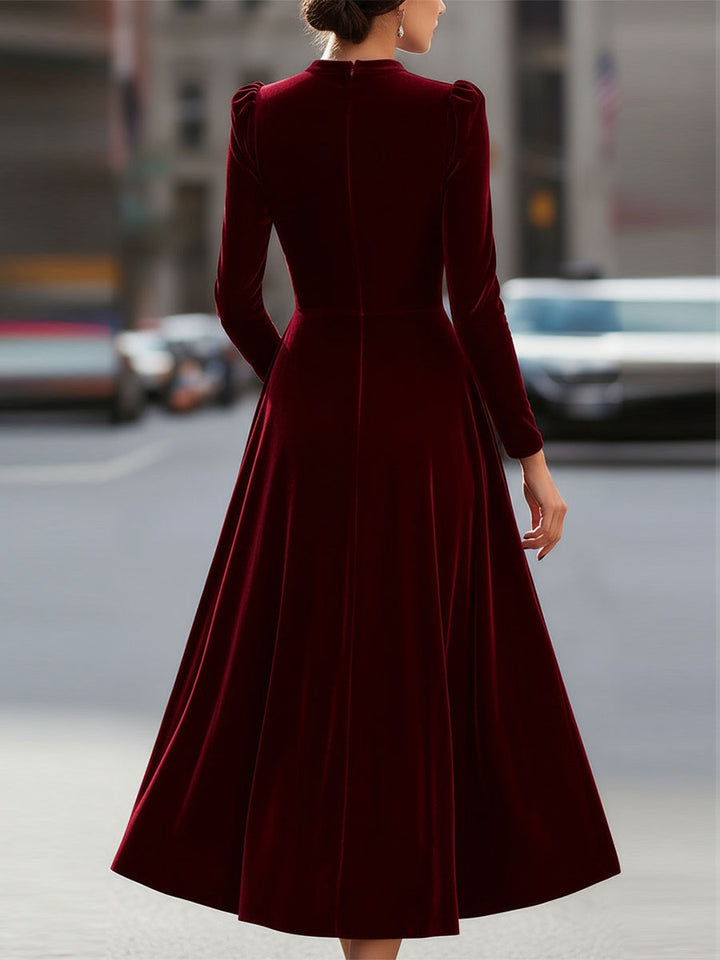 Black Long-Sleeve A-Line Midi Dress. Versatile for wedding guest, cocktail, or formal events.
