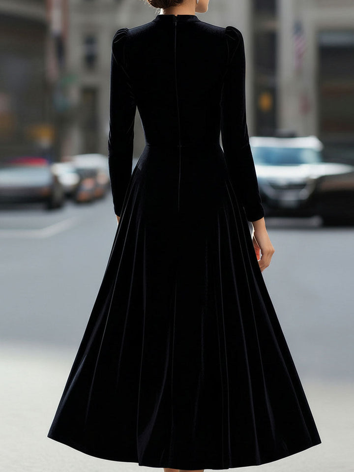 Stylish Navy Long-Sleeve A-Line Midi Dress. Perfect wedding guest or formal event attire.