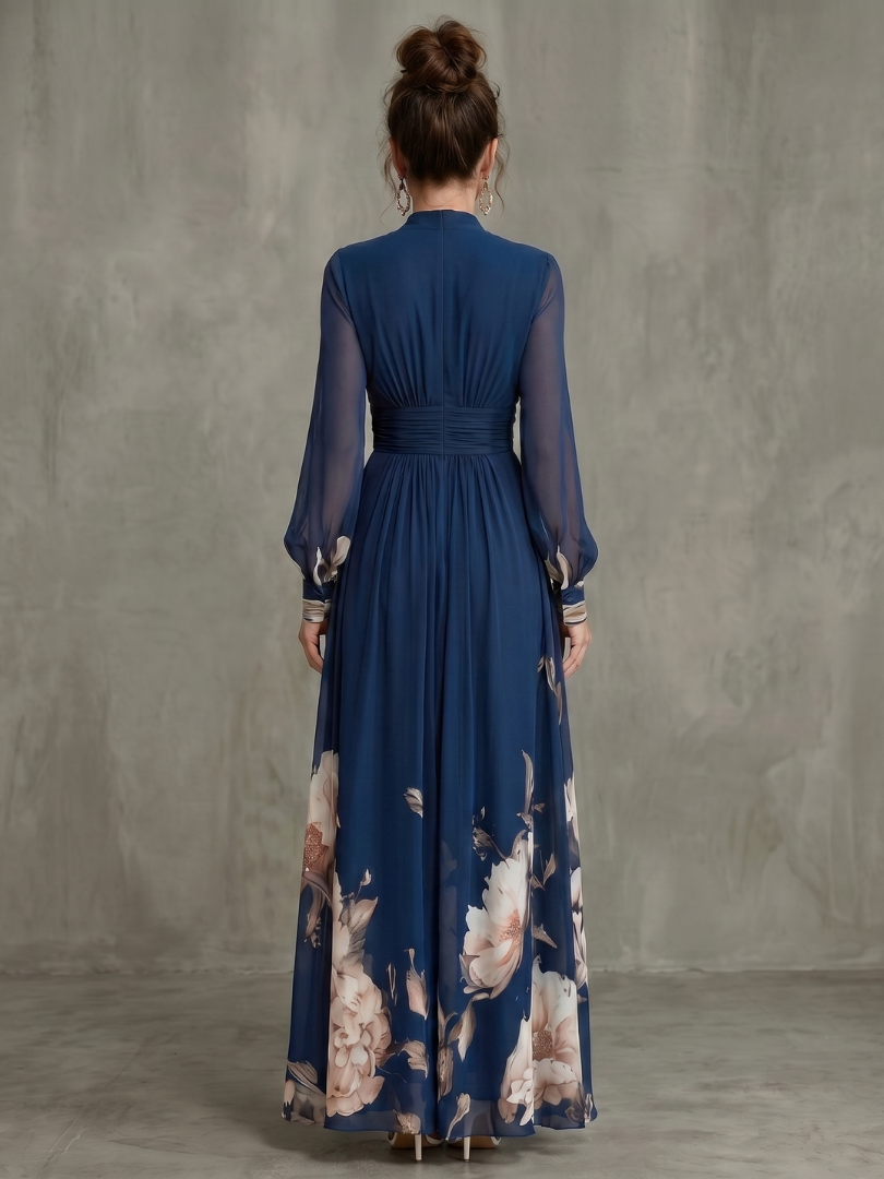Formal navy blue maxi dress for women, featuring a chic print, elegant sheer sleeves, and a daring plunge neck design.