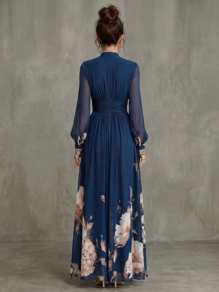 Formal navy blue maxi dress for women, featuring a chic print, elegant sheer sleeves, and a daring plunge neck design.
