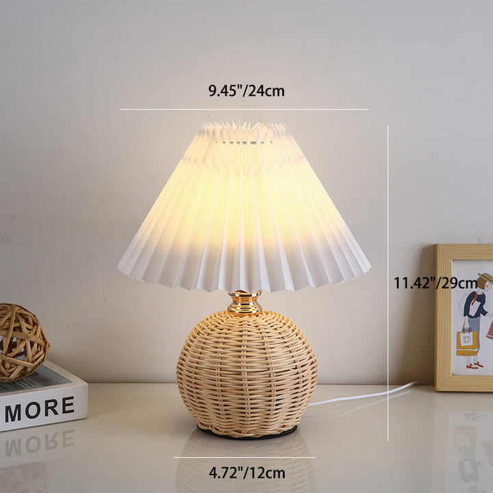Modern bedroom lighting with a Nordic rattan LED table lamp, eco-friendly & stylish.