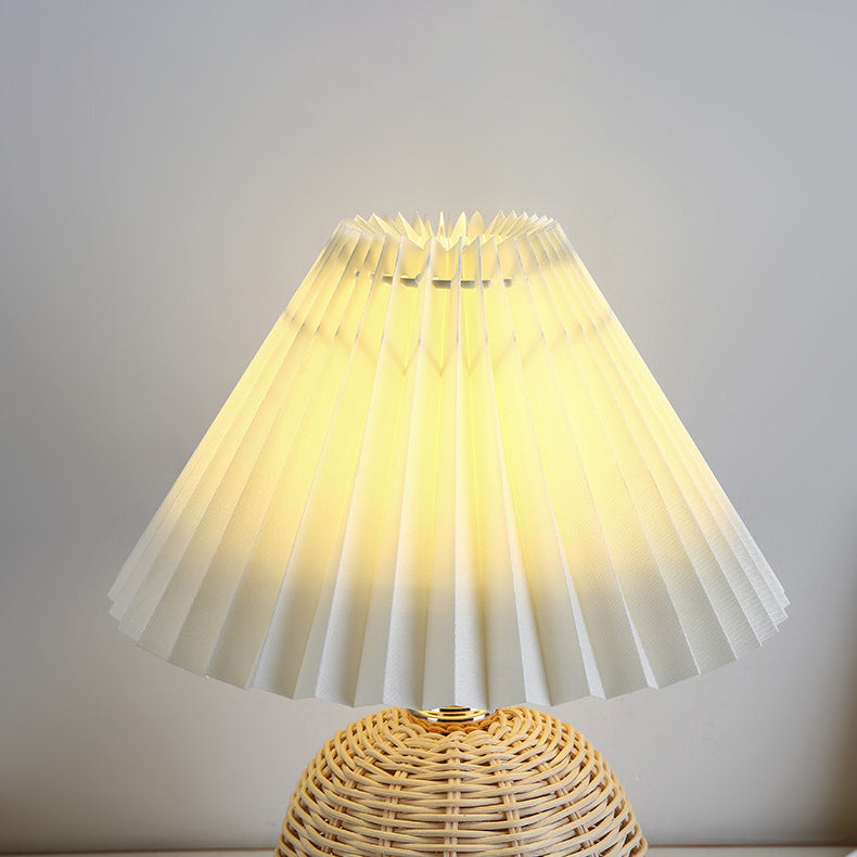 Stylish Nordic rattan table lamp, energy-efficient LED for modern bedroom and home decor.