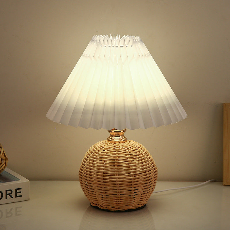 Elegant Nordic rattan lamp, modern LED table light with fabric shade for bedroom style.
