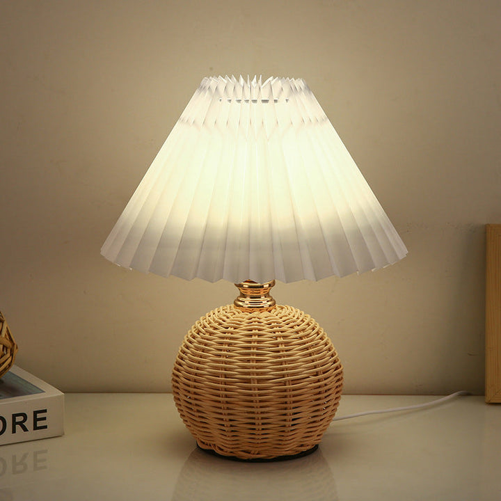 Elegant Nordic rattan lamp, modern LED table light with fabric shade for bedroom style.