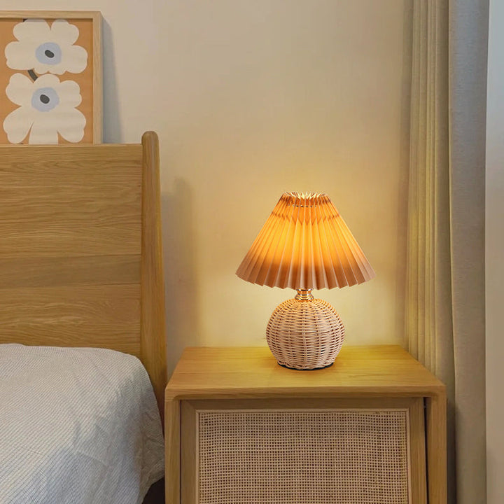 USB powered LED table lamp, elegant rattan base and fabric shade for Nordic bedrooms.