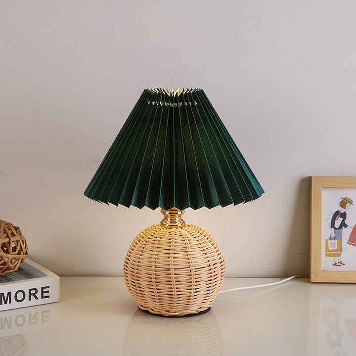 Eco-friendly rattan LED table lamp, modern Nordic style for living room and bedroom decor.