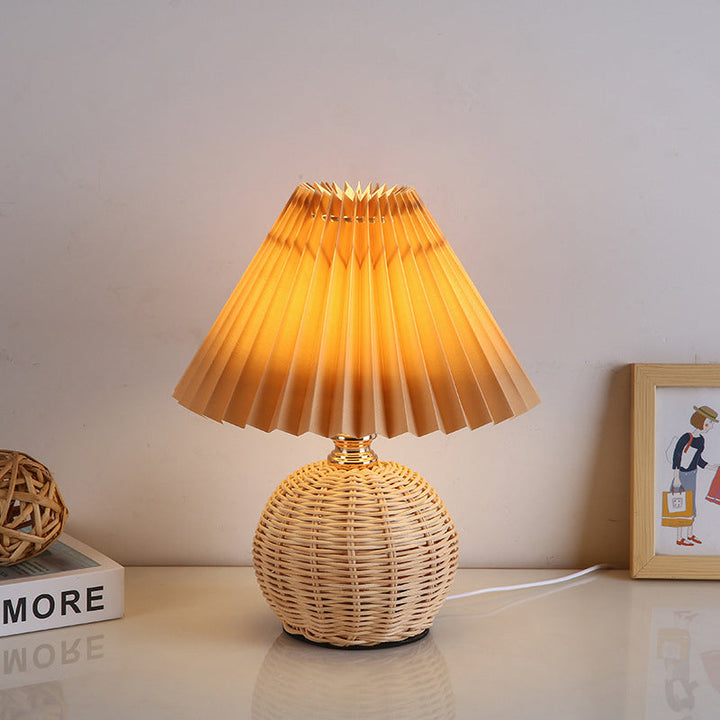 Eco-friendly USB powered LED table lamp, elegant rattan design for bedroom lighting.