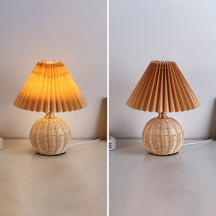 Stylish LED rattan table lamp, modern home decor accent for any bedroom or living area.