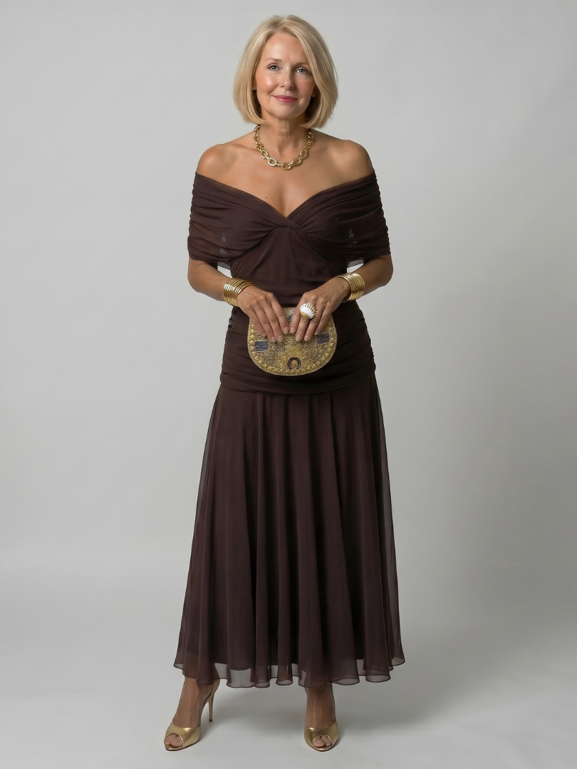 Green off-shoulder draped midi dress, a stylish flowy choice for women's summer events.