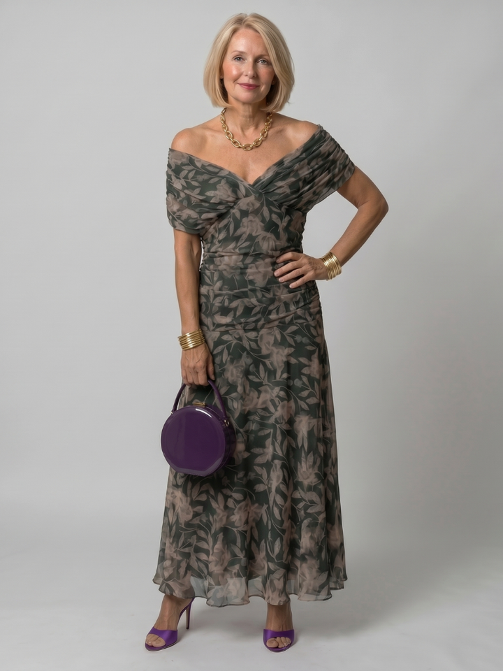 Women's purple off-shoulder midi dress, a chic flowy style for evening wear.