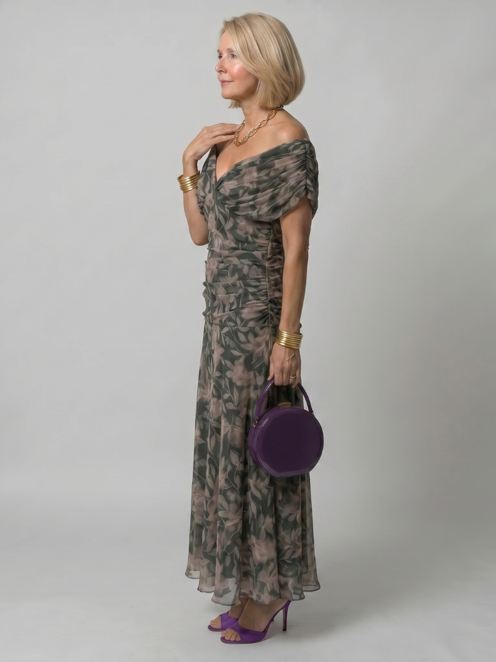 Comfortable green off-shoulder flowy midi dress, perfect for women's casual outings.